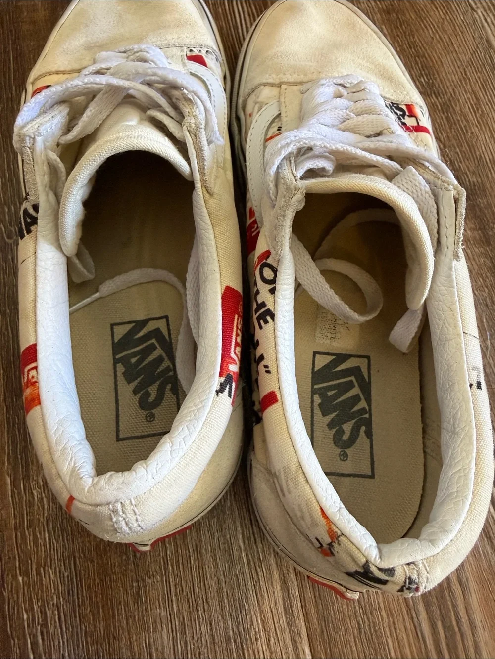 Vans White Canvas Low-Top Sneakers with Red & Black Graphic Accents